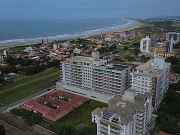 PARE DE SONHAR COM O MAR. VENHA MORAR DE FRENTE PARA ELE